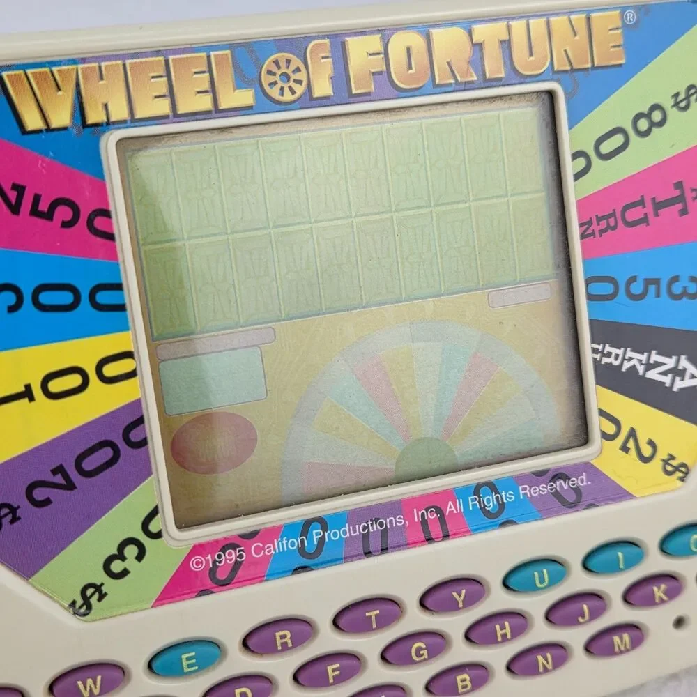Vtg 1995 Tiger Electronics Wheel Of Fortune Handheld Game w/Cartridge Tested